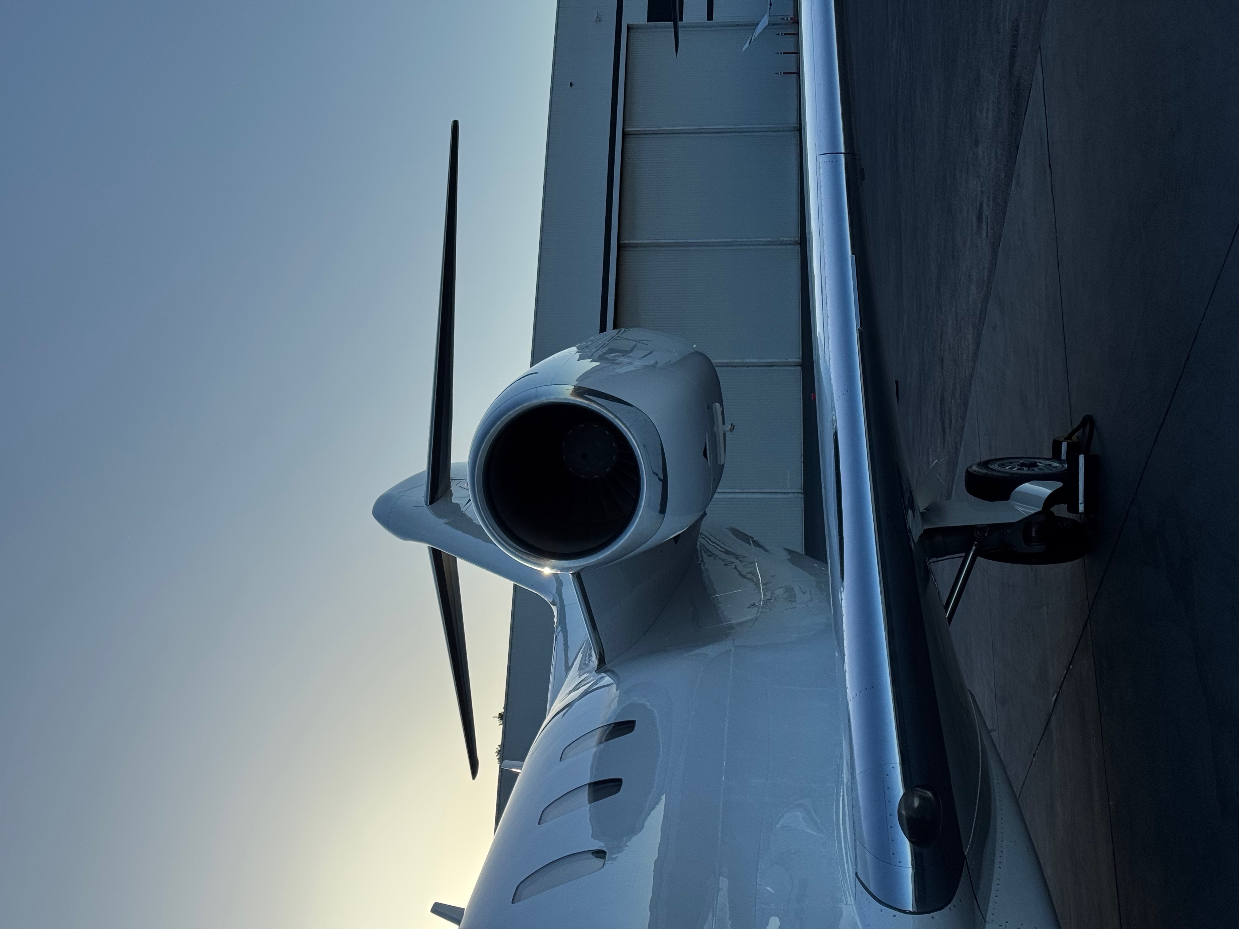 Bay Area Aircraft Brightwork Polishing — business jet engine nacelle and wing polished at dusk